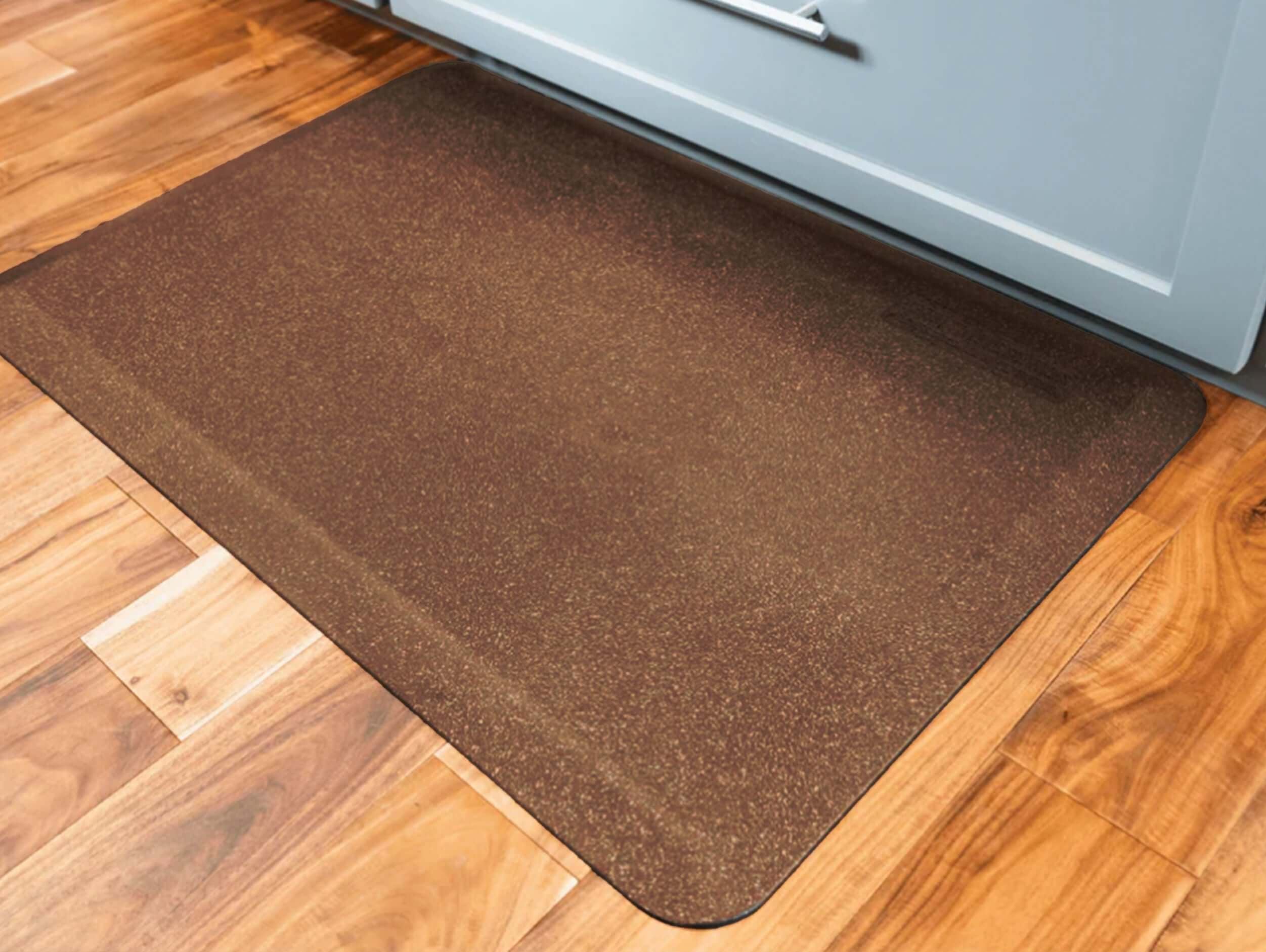 A granite copper WellnessMat in a kitchen